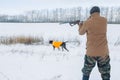 Active hunter discharging his gun into the air Royalty Free Stock Photo