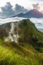 Active Indonesian volcano Batur in the tropical island Bali. Indonesia. Batur volcano sunrise serenity. Dawn sky at