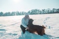 Active Irish Setter dog with woman running slow motion footage during the snowy walking, having fun in winter park. High Royalty Free Stock Photo