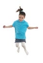 Active Joyful Young Girl Jumping with Joy