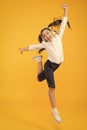 Active kid. Girl on way to knowledge. Knowledge day. Back to school. Kid cheerful schoolgirl full energy jump. Pupil Royalty Free Stock Photo