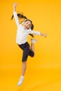 Active kid. Girl on way to knowledge. Knowledge day. Back to school. Kid cheerful schoolgirl full energy jump. Pupil Royalty Free Stock Photo