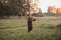 Active leisure. A boy child is playing football outdoors in the countryside. Royalty Free Stock Photo