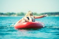 Young sexy woman swimming on paddle board.Water sports , active lifestyle. Royalty Free Stock Photo