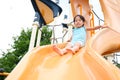 Active little toddler girl on the playground