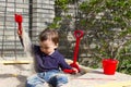 Active little boy on playground. playing child in sandbox Royalty Free Stock Photo