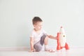 Active little boy playing the rocket toys, Child showing rocket toy with happy face, Children or Toddler learning and Royalty Free Stock Photo