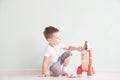 Active little boy playing the rocket toys, Child showing rocket toy with happy face, Children or Toddler learning and Royalty Free Stock Photo