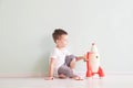 Active little boy playing the rocket toys, Child showing rocket toy with happy face, Children or Toddler learning and Royalty Free Stock Photo