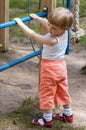 Active little child climbing on a ladder Royalty Free Stock Photo