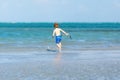 Active little kid boy having fun on Miami beach, Key Biscayne. Happy cute child running near ocean on warm sunny day Royalty Free Stock Photo