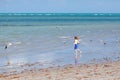 Active little kid boy having fun on Miami beach, Key Biscayne. Happy cute child running near ocean on warm sunny day Royalty Free Stock Photo
