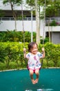 Active little toddler child playing swing at the playground. Happy and fun time Royalty Free Stock Photo