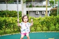 Active little toddler child playing swing at the playground. Happy and fun time Royalty Free Stock Photo