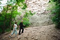 Active loving senior couple walking in beautiful summer forest Royalty Free Stock Photo