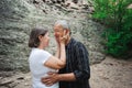 Active loving senior couple walking in beautiful summer forest Royalty Free Stock Photo