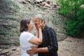 Active loving senior couple walking in beautiful summer forest - active retirement concept Royalty Free Stock Photo