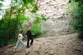 Active loving senior couple walking in beautiful summer forest - active retirement concept. Royalty Free Stock Photo