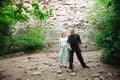 Active loving senior couple walking in beautiful summer forest - active retirement concept. Royalty Free Stock Photo