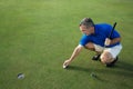 Active Male Golfer Putting Royalty Free Stock Photo