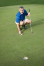 Active Male Golfer Putting Royalty Free Stock Photo