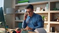 Active man holding telephone call workplace. Designer typing computer keyboard Royalty Free Stock Photo