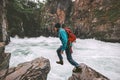 Active man jumping on rocks travel adventure active vacations Royalty Free Stock Photo