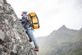 Brave alone lifestyle tourist conquers the mountain Royalty Free Stock Photo