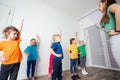 Active and motivated kids doing sport exercises at kindergarten Royalty Free Stock Photo