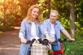 Active old age, people and lifestyle concept happy senior couple riding Royalty Free Stock Photo