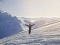 Active old aged senior experienced mature skier man in ski suit riding skies mountain peak, slope, enjoy winter extreme