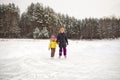Active rest on nature. children skates on natural ice rink - lake.