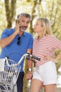 active senior couple with bicycle Royalty Free Stock Photo
