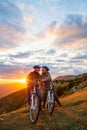 Active Senior Couple on country bike ride. Kissing on their break. Royalty Free Stock Photo