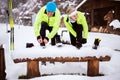 Senior couple getting ready for cross-country skiing. Royalty Free Stock Photo