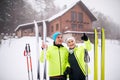 Senior couple getting ready for cross-country skiing. Royalty Free Stock Photo