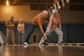 Active Senior Couple Playing Bowling Side View Royalty Free Stock Photo