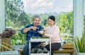 active senior couple spend free time take care cactus plant together at home Royalty Free Stock Photo