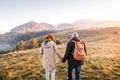 Senior couple on a walk in an autumn nature. Royalty Free Stock Photo