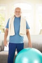 Active senior exercising with fit ball Royalty Free Stock Photo