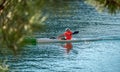 Active Senior Kayaker. Senior Man Enjoying Kayaking on Lake. active seniors go in for sports. Old and mature man having fun and