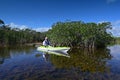 Active senior kayaking on Nine Mike Pond in Everglades National Park, Florida. Royalty Free Stock Photo