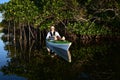 Active senior kayaking on Nine Mike Pond in Everglades National Park, Florida. Royalty Free Stock Photo