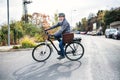 Active senior man with electrobike cycling outdoors in town. Royalty Free Stock Photo