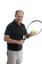 Active senior man playing tennis with beer belly Royalty Free Stock Photo