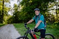 Active senior man riding bicycle at summer park, healthy lifestyle concept. Royalty Free Stock Photo