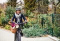 Active senior woman with electrobike cycling outdoors in town. Royalty Free Stock Photo