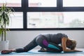 Active senior woman practicing yoga indoors Royalty Free Stock Photo