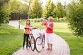 Active senior woman riding bike in a park Royalty Free Stock Photo