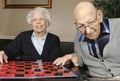 Active Seniors Playing Checkers